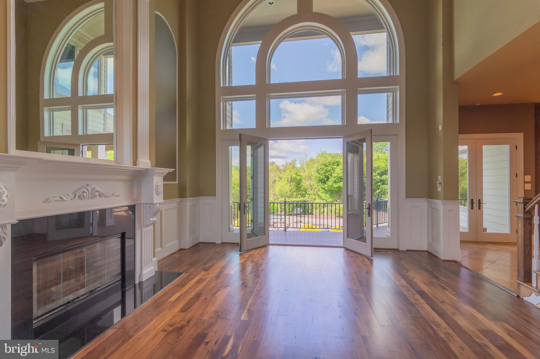 2016 Dixon Road Frederick, MD 21704 - Photo 35 of 118 FIREPLACE AND WALLS OF WINDOWS