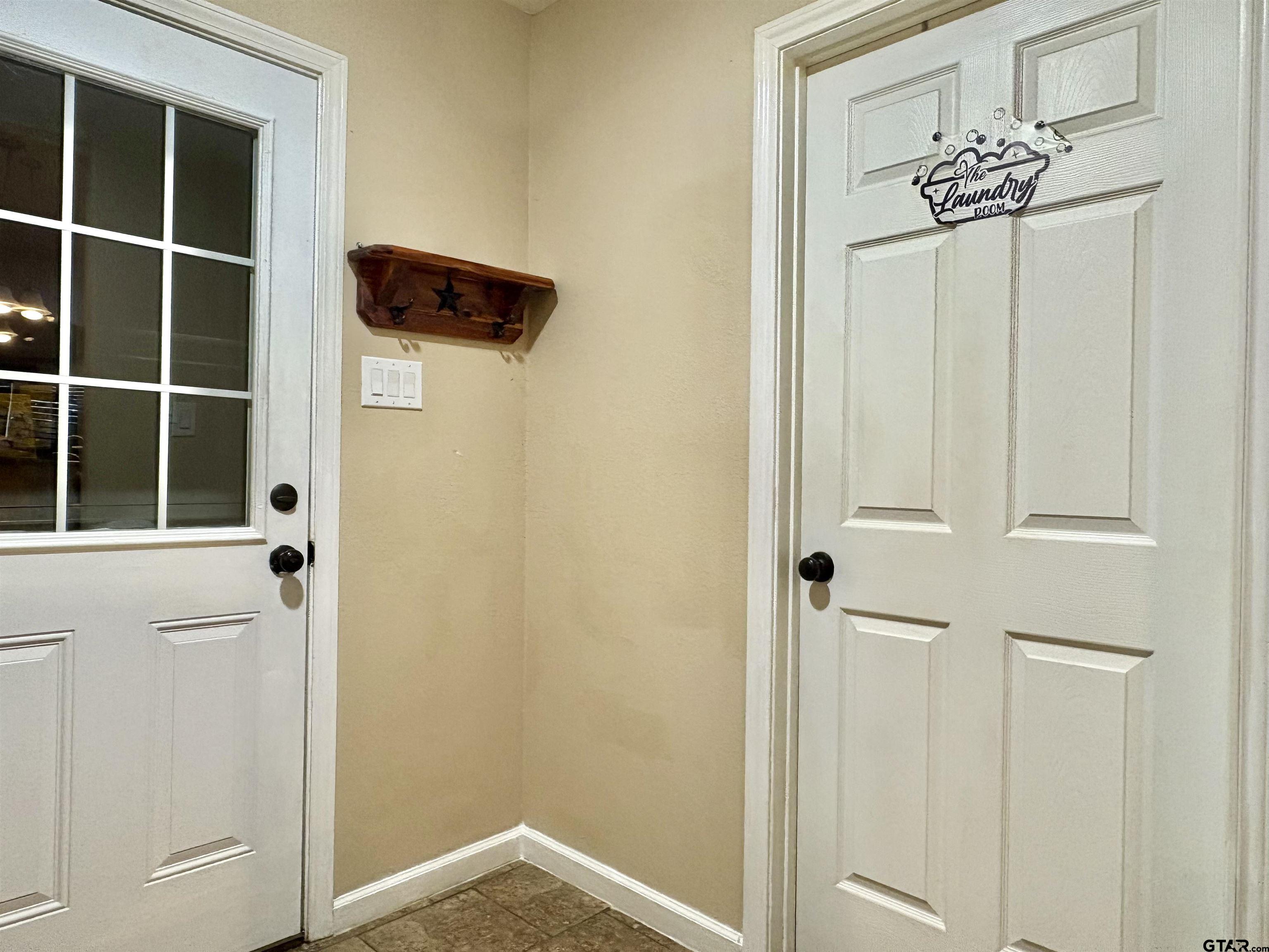 28 County Road 3101 Pittsburg, TX 75686 - Photo 35 of 39 a view of a hallway with wooden door
