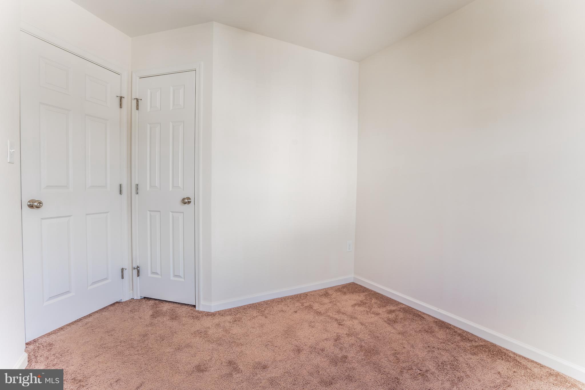 6876 Tasker Falls, Unit 77 Elkridge, MD 21075 - Photo 21 of 30 a view of an empty room