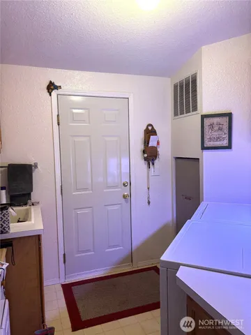 a view of a yard with swimming pool