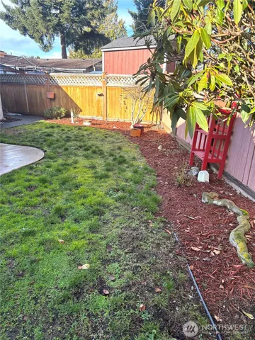 a view of a park with large trees