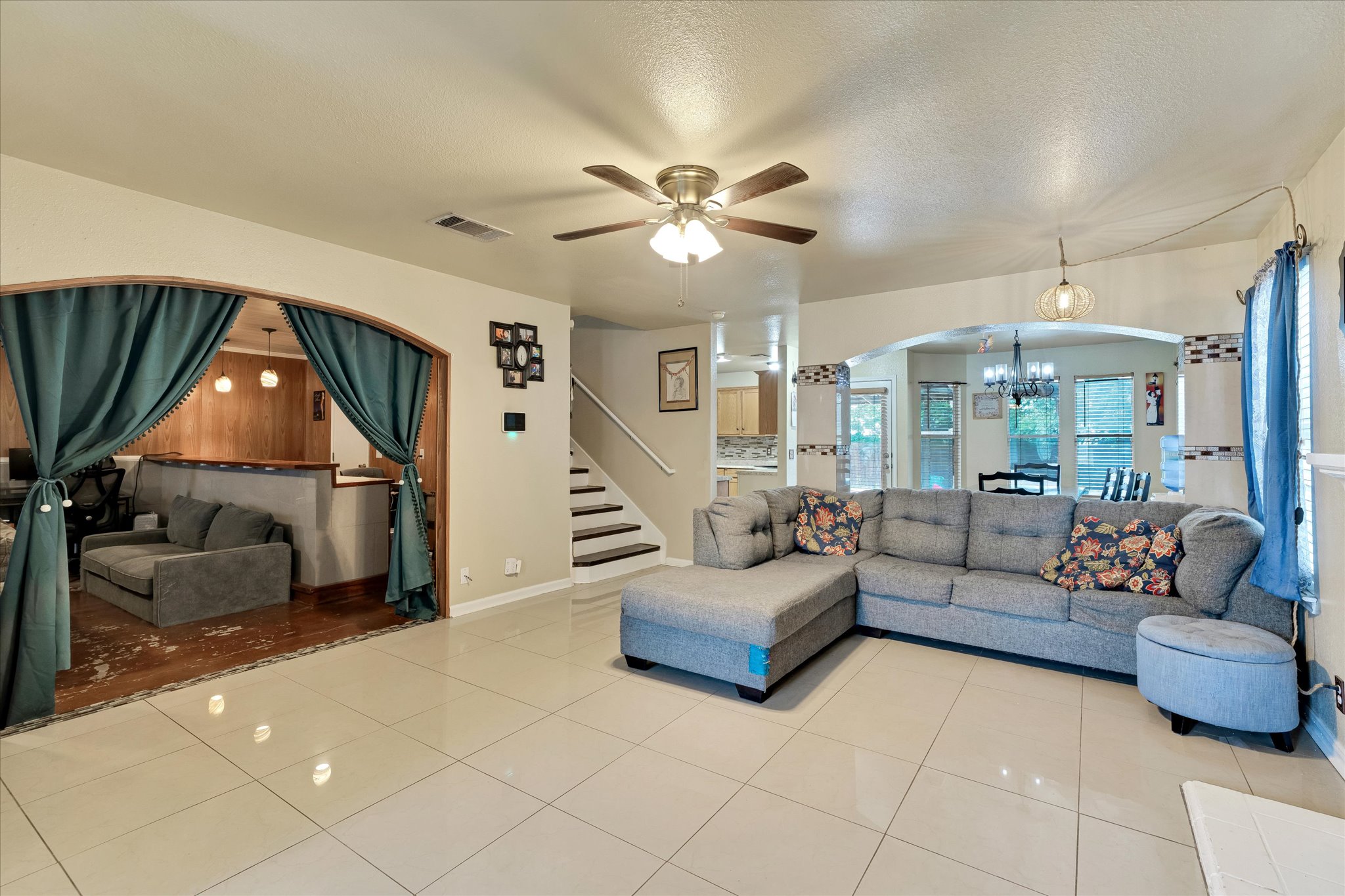 2601 Highcloud Drive Lockhart, TX 78644 - Photo 5 of 30 a living room with furniture and a chandelier
