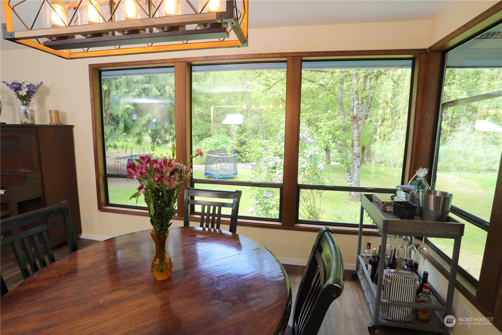 12503 Issaquah-Hobart Road Southeast Issaquah, WA 98027 - Photo 13 of 39 a living room filled with furniture and a potted plant