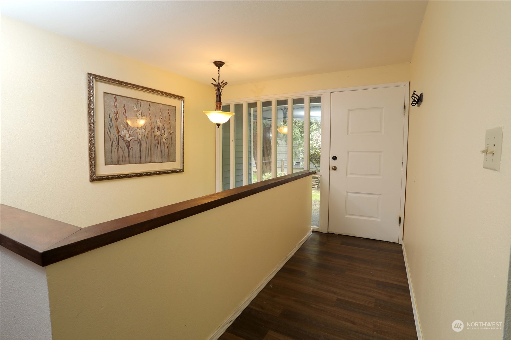 12503 Issaquah-Hobart Road Southeast Issaquah, WA 98027 - Photo 22 of 39 a view of a hallway with wooden floor and staircase