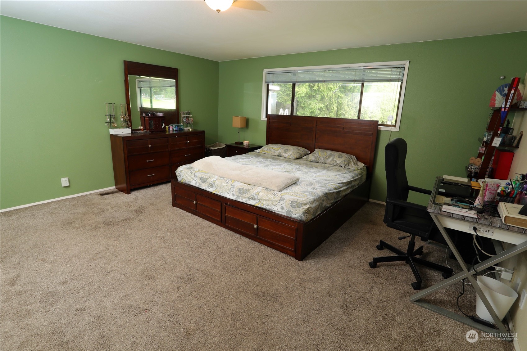 12503 Issaquah-Hobart Road Southeast Issaquah, WA 98027 - Photo 31 of 39 a bedroom with a bed window and desk