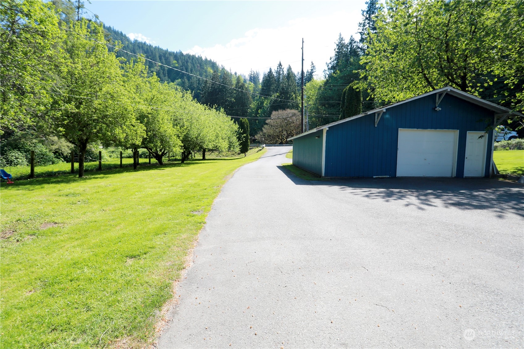 12503 Issaquah-Hobart Road Southeast Issaquah, WA 98027 - Photo 6 of 39 a view of a house with a yard