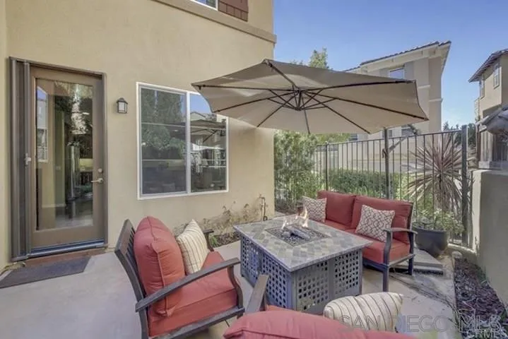 1535 Chert Drive San Marcos, CA 92078 - Photo 18 of 24 a outdoor space with patio the couches and a potted plant on the table