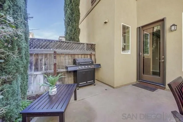 1535 Chert Drive San Marcos, CA 92078 - Photo 19 of 24 a view of backyard with a deck and wooden floor