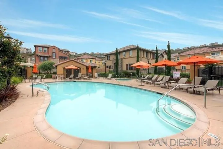 1535 Chert Drive San Marcos, CA 92078 - Photo 20 of 24 swimming pool view with a seating space and a garden view