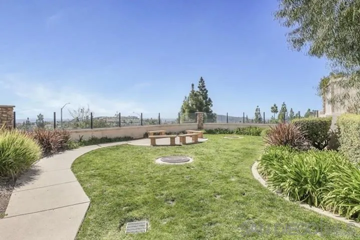 1535 Chert Drive San Marcos, CA 92078 - Photo 22 of 24 a swimming pool with outdoor seating and yard