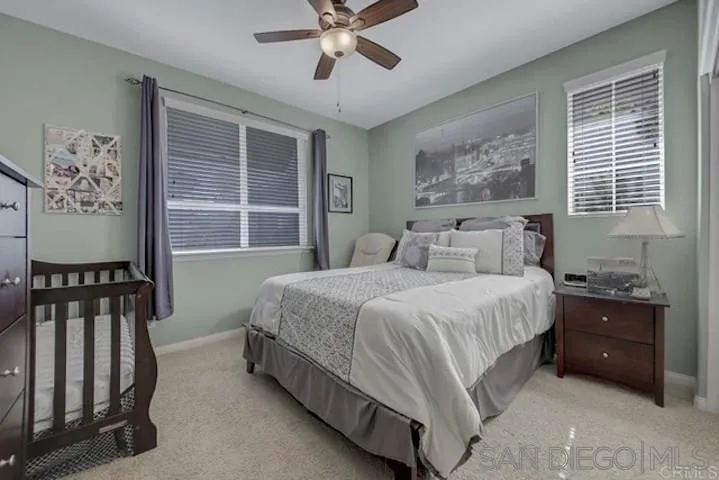 1535 Chert Drive San Marcos, CA 92078 - Photo 10 of 24 a bedroom with a bed and a window