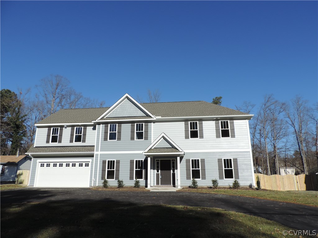 12246 Church Road Henrico, VA 23233 - Photo 2 of 9 Fenced in backyard and circular driveway