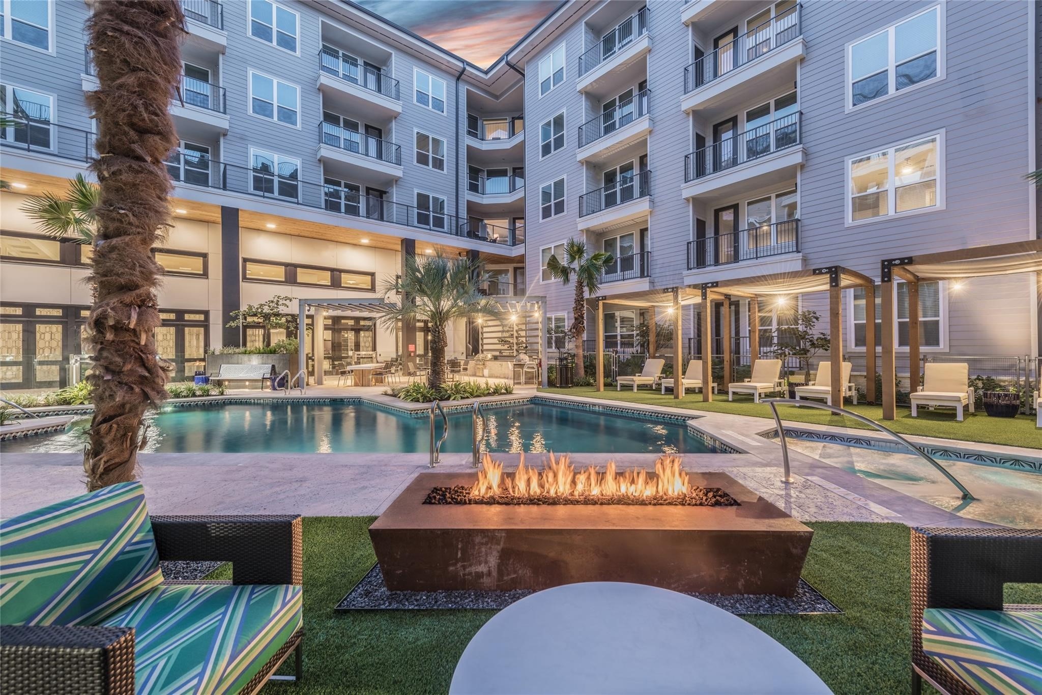 3100 Kramer Lane, Unit 515 Austin, TX 78758 - Photo 15 of 16 a view of building with outdoor seating