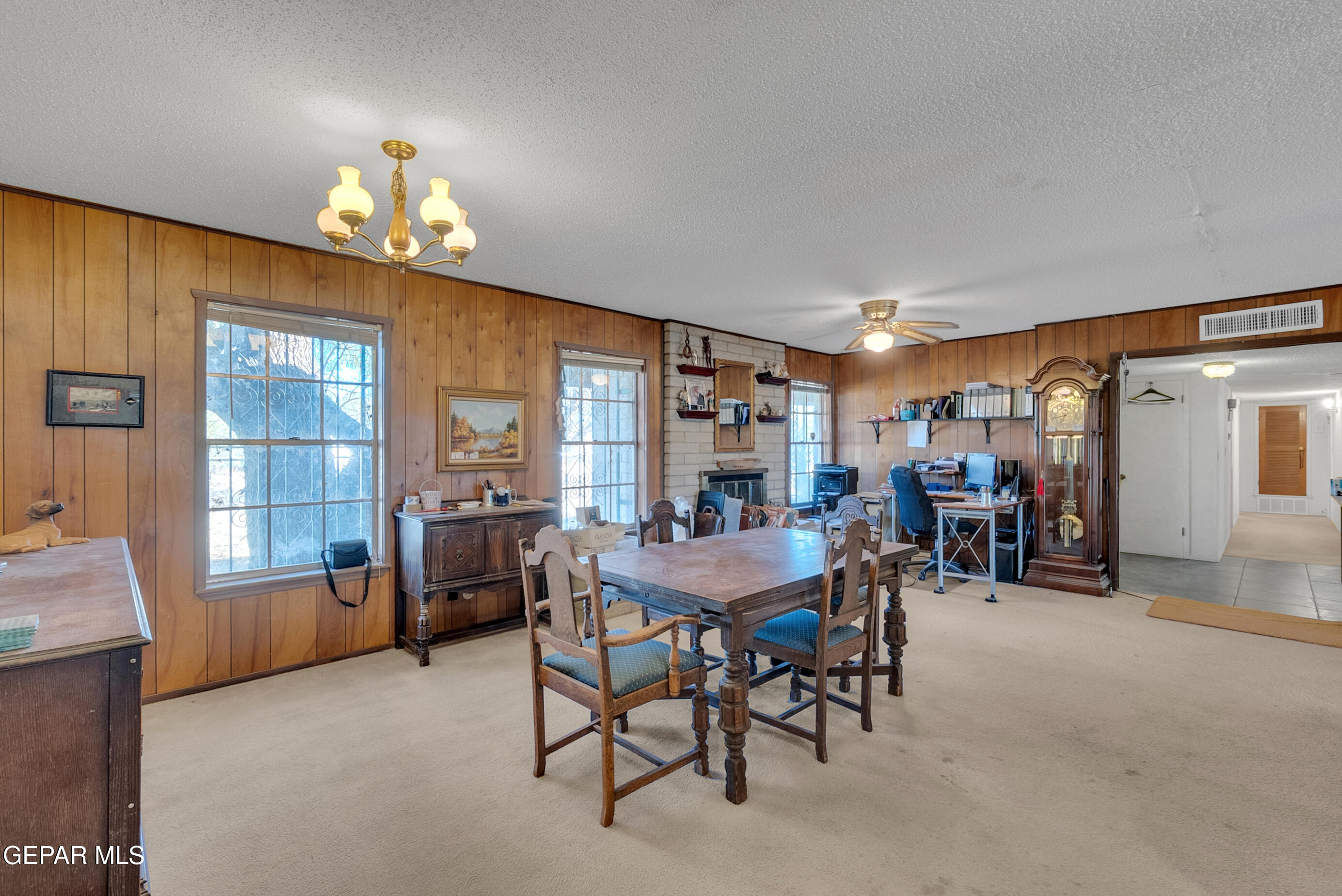 299 Tranquility Road Canutillo, TX 79835 - Photo 23 of 55 a view of a dining room with furniture window and outside view