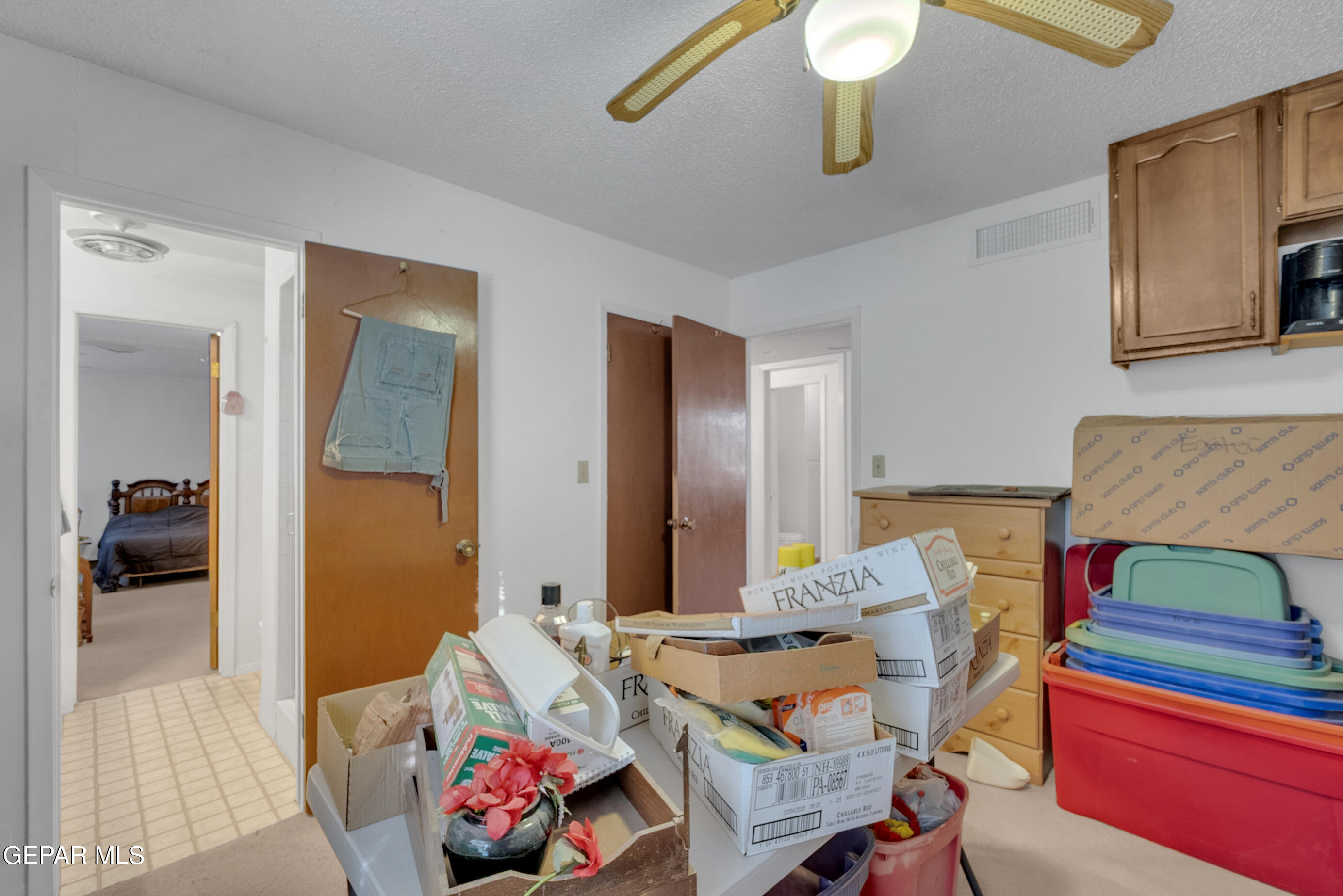 299 Tranquility Road Canutillo, TX 79835 - Photo 28 of 55 a living room with furniture and wooden floor