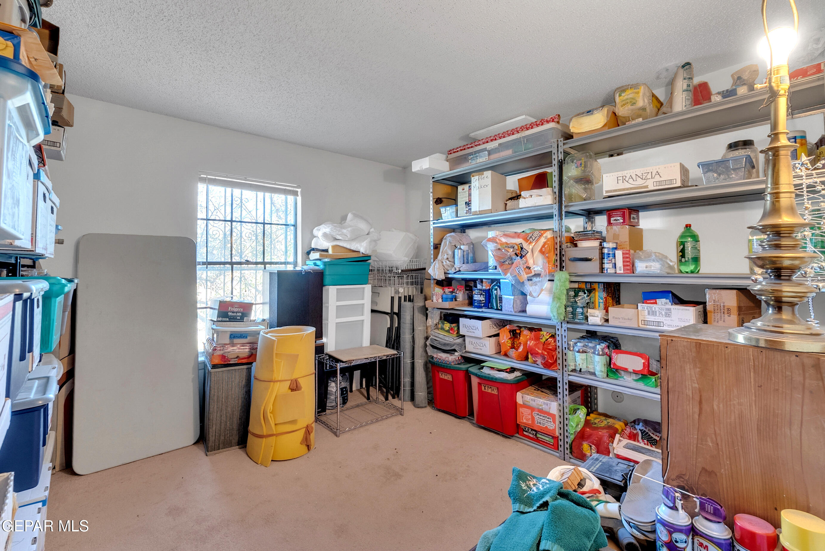 299 Tranquility Road Canutillo, TX 79835 - Photo 38 of 55 a room with storage and utility