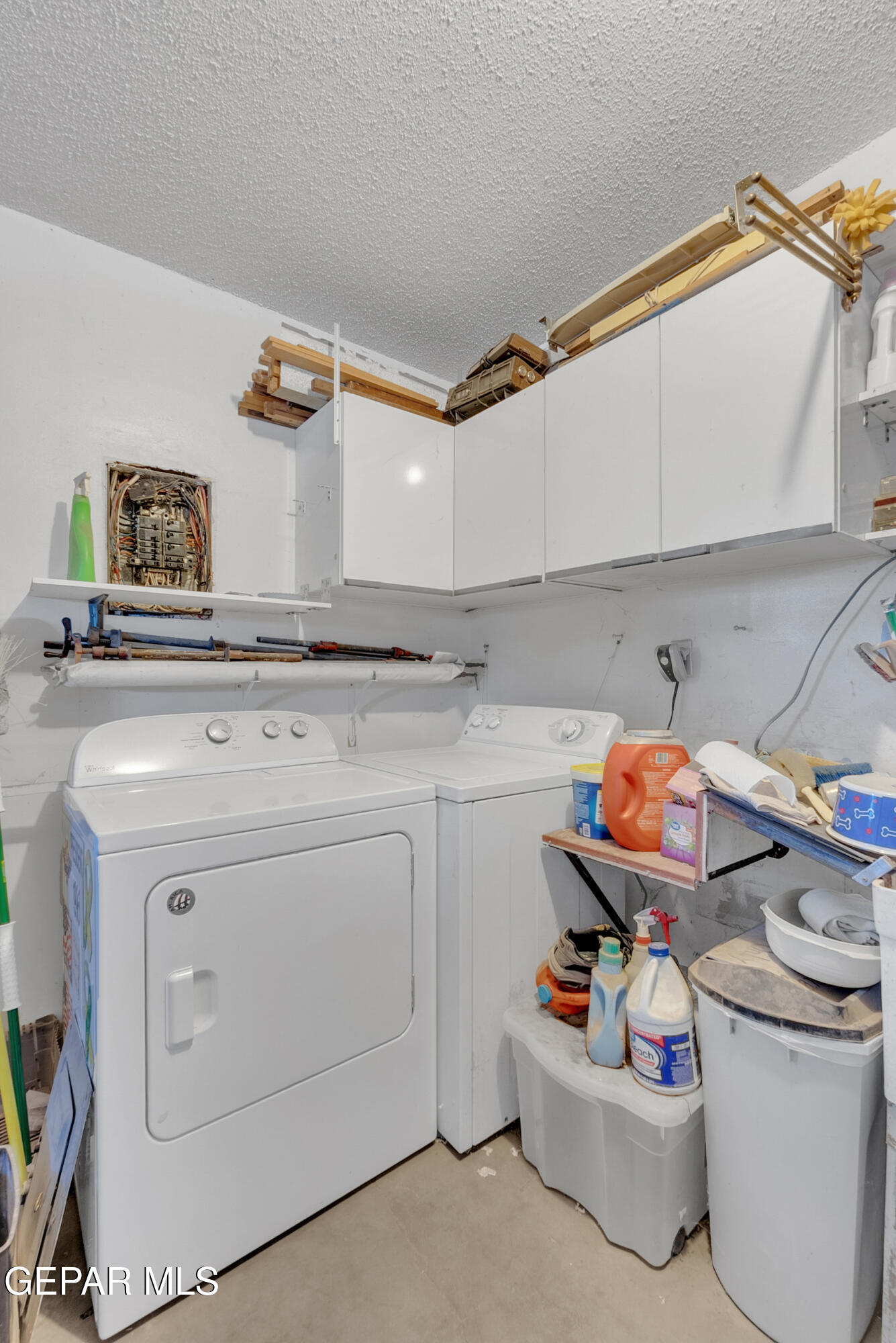 299 Tranquility Road Canutillo, TX 79835 - Photo 45 of 55 a utility room with sink dryer and washer