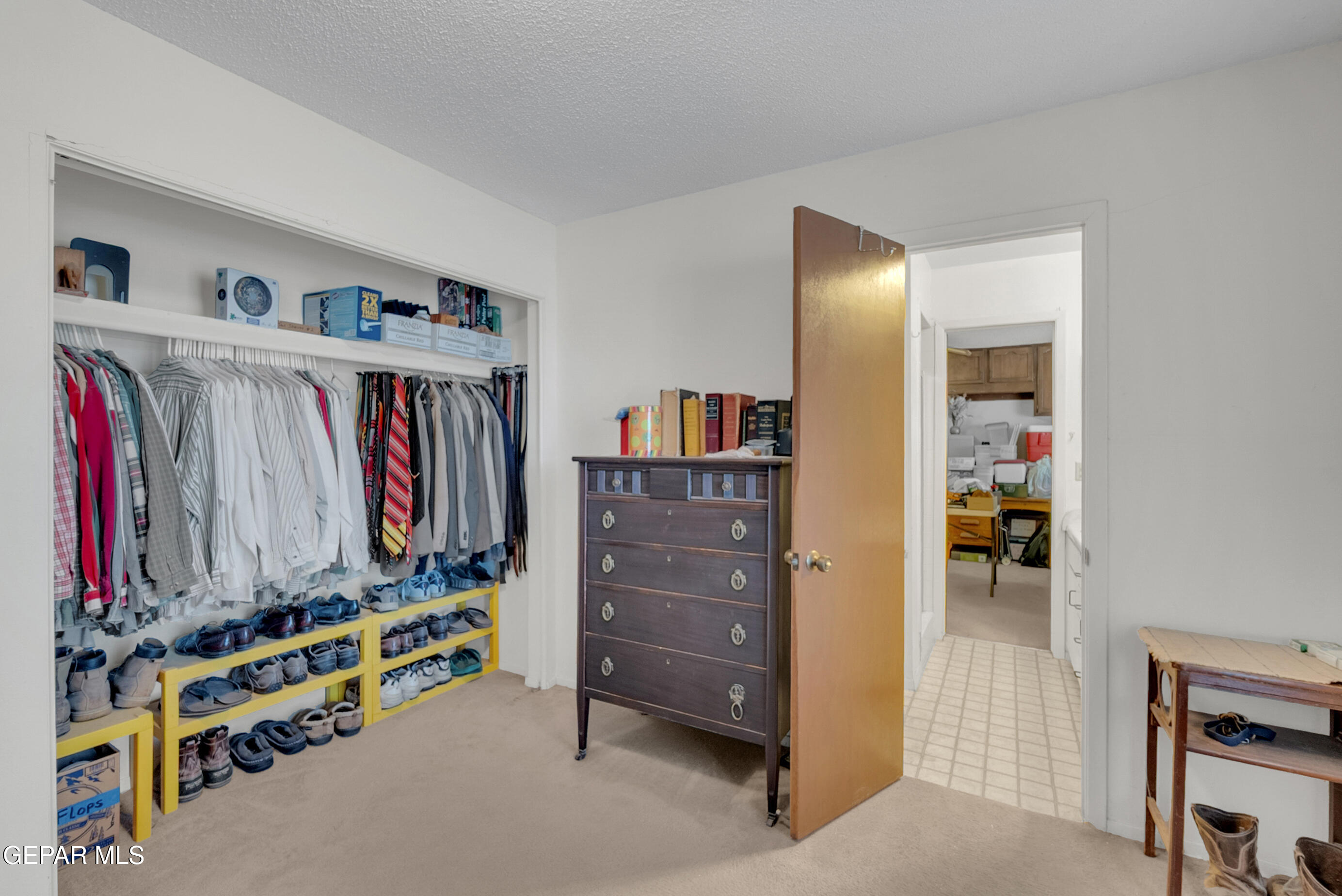 299 Tranquility Road Canutillo, TX 79835 - Photo 7 of 55 a view of walk in closet with clothes