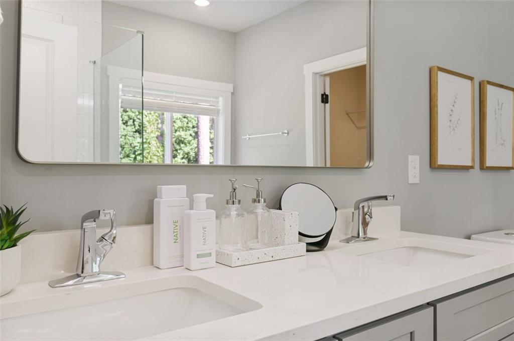4620 Timrose Road Northwest Kennesaw, GA 30144 - Photo 17 of 30 a bathroom with a sink and a mirror
