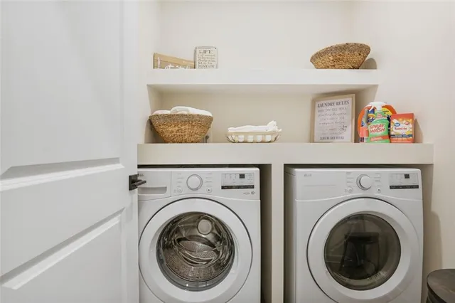 a utility room with dryer and washer