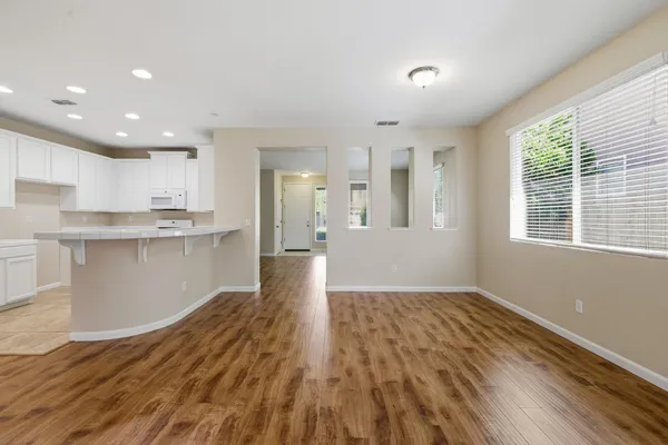 a view of a kitchen with kitchen and a window