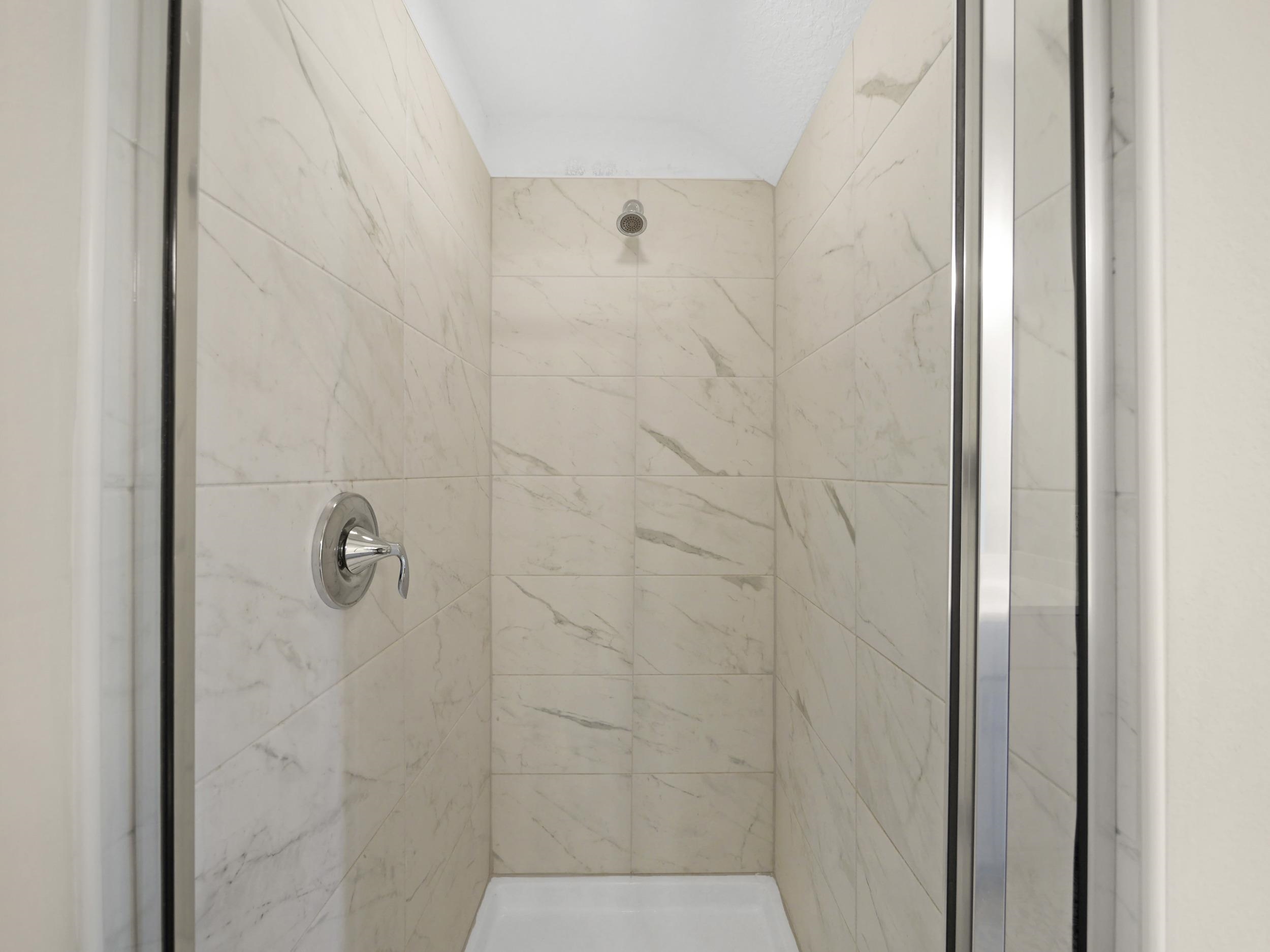 471 Rum Runner Way St. Johns, FL 32259 - Photo 21 of 42 a bathroom with a shower