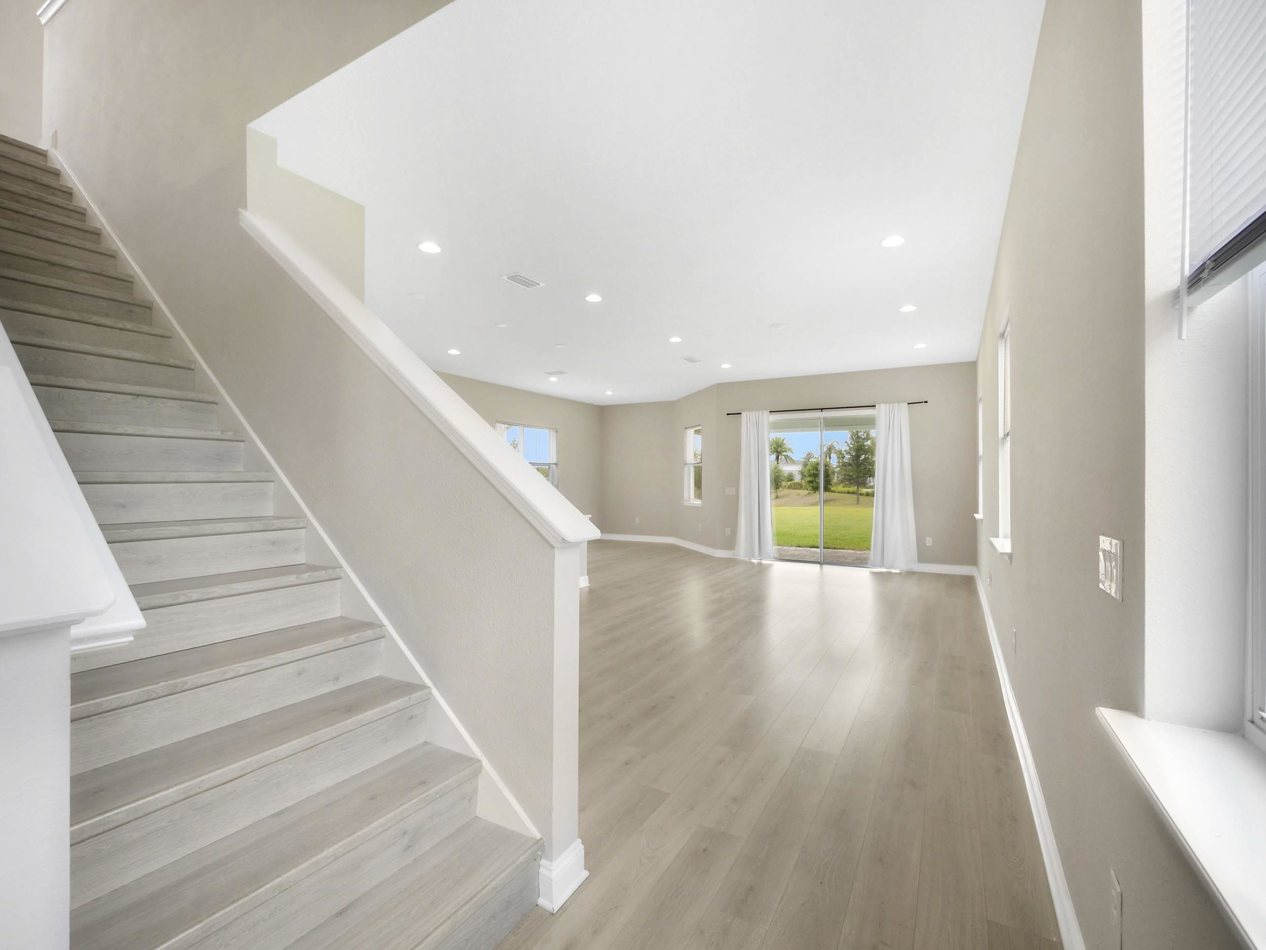 471 Rum Runner Way St. Johns, FL 32259 - Photo 22 of 42 a view of an entryway with wooden floor