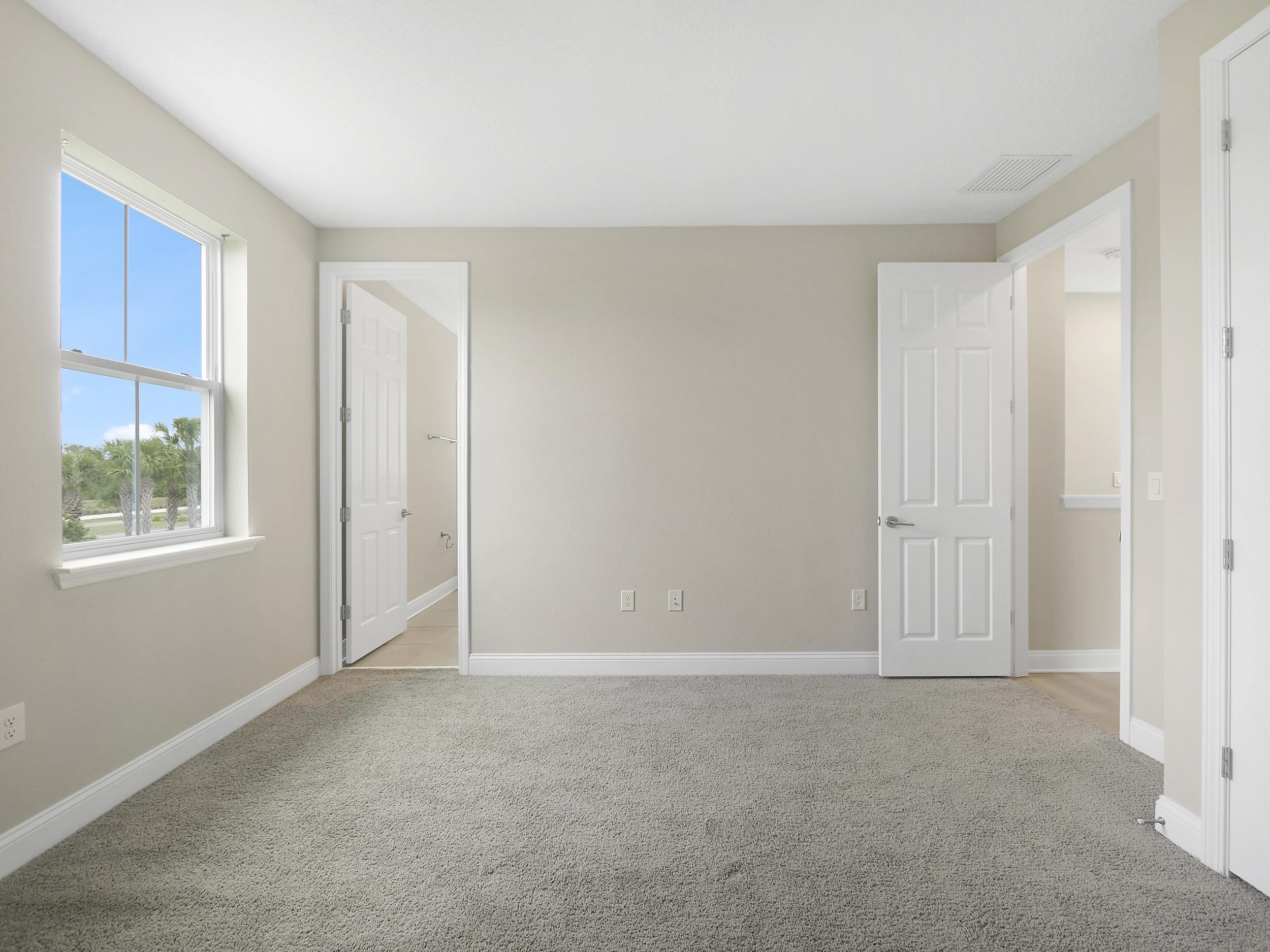 471 Rum Runner Way St. Johns, FL 32259 - Photo 31 of 42 a view of an empty room with a window