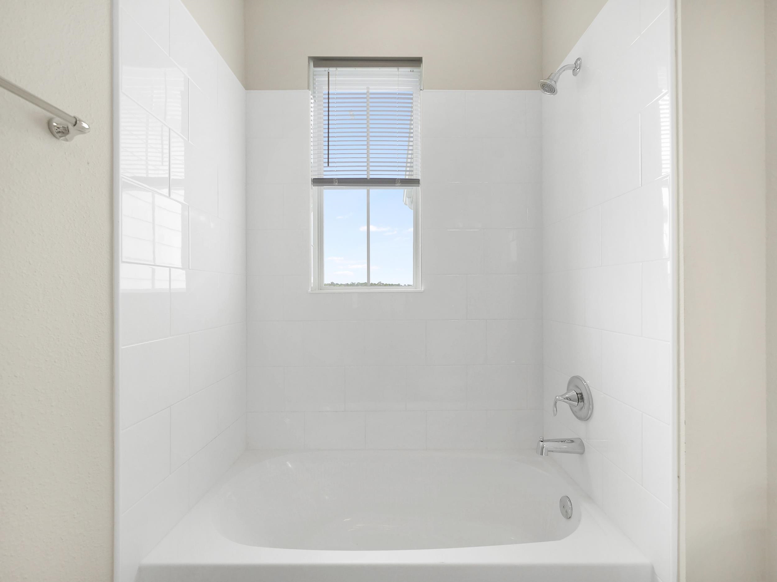 471 Rum Runner Way St. Johns, FL 32259 - Photo 33 of 42 a close up of a bathtub curtain