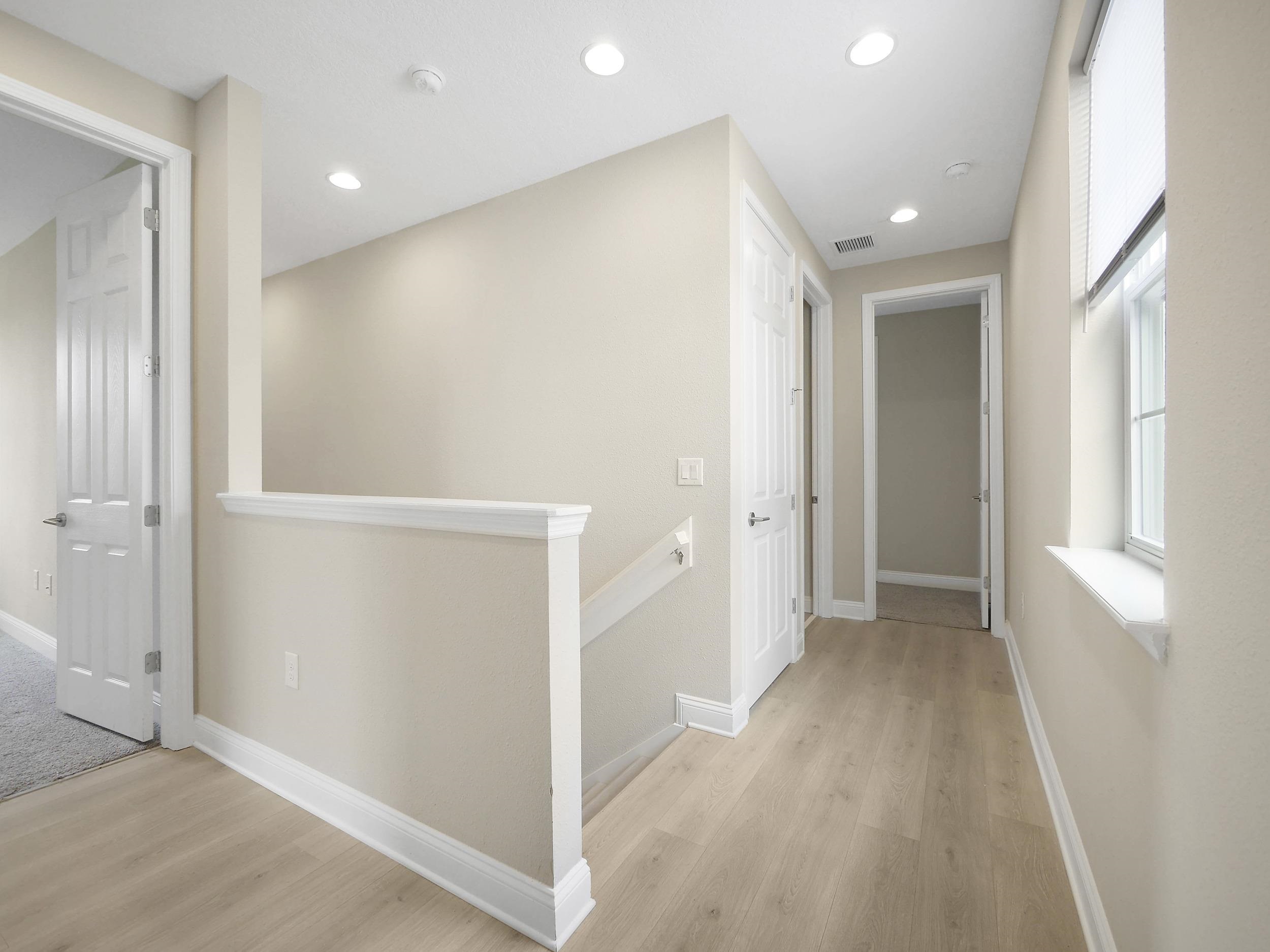 471 Rum Runner Way St. Johns, FL 32259 - Photo 34 of 42 wooden floor in an empty room with a window
