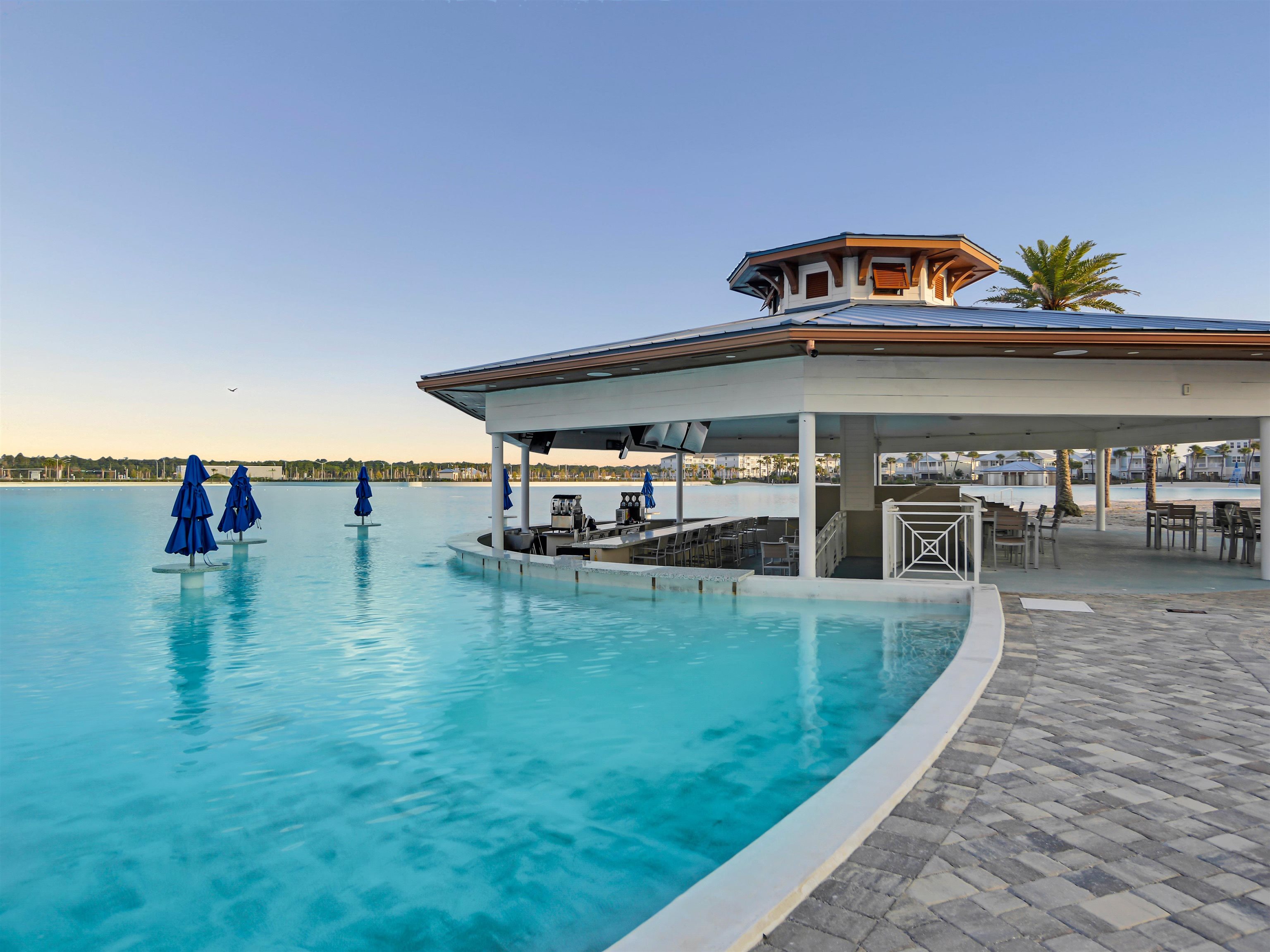 471 Rum Runner Way St. Johns, FL 32259 - Photo 6 of 42 a swimming pool with outdoor seating and lake view