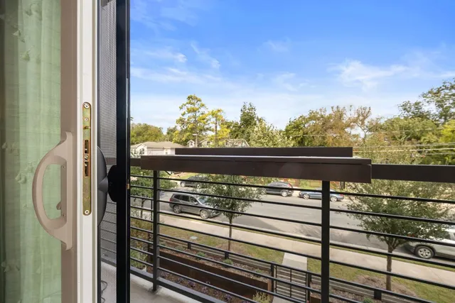 a view of balcony with furniture