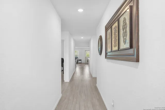 a view of a backyard with a garden and plants