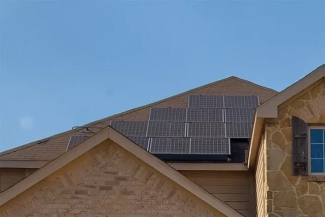a view of an empty room with a staircase