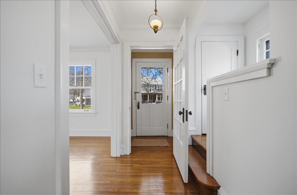 503 East Chestnut Street Bloomington, IL 61701 - Photo 12 of 24 wooden floor with white walls