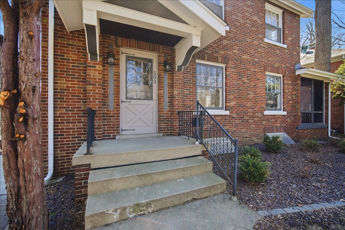 503 East Chestnut Street Bloomington, IL 61701 - Photo 24 of 24 a view of house with wooden stairs