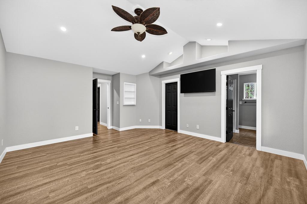 1149 Swanson Lane Colfax, CA 95713 - Photo 19 of 52 a view of an empty room with window and wooden floor