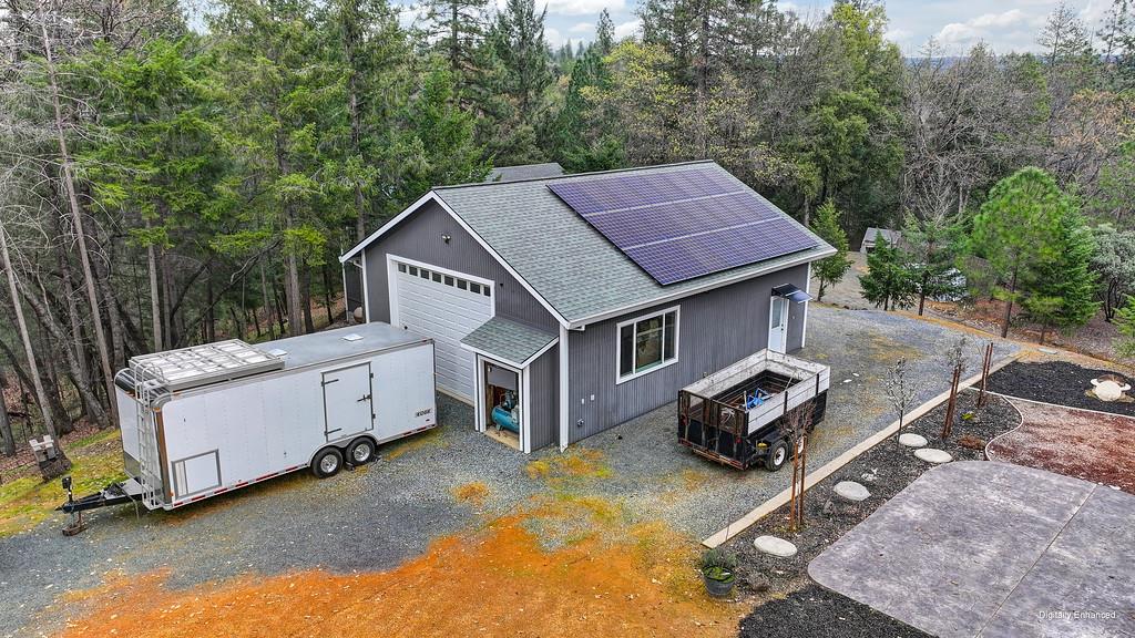 1149 Swanson Lane Colfax, CA 95713 - Photo 4 of 52 a view of a small house in the back yard