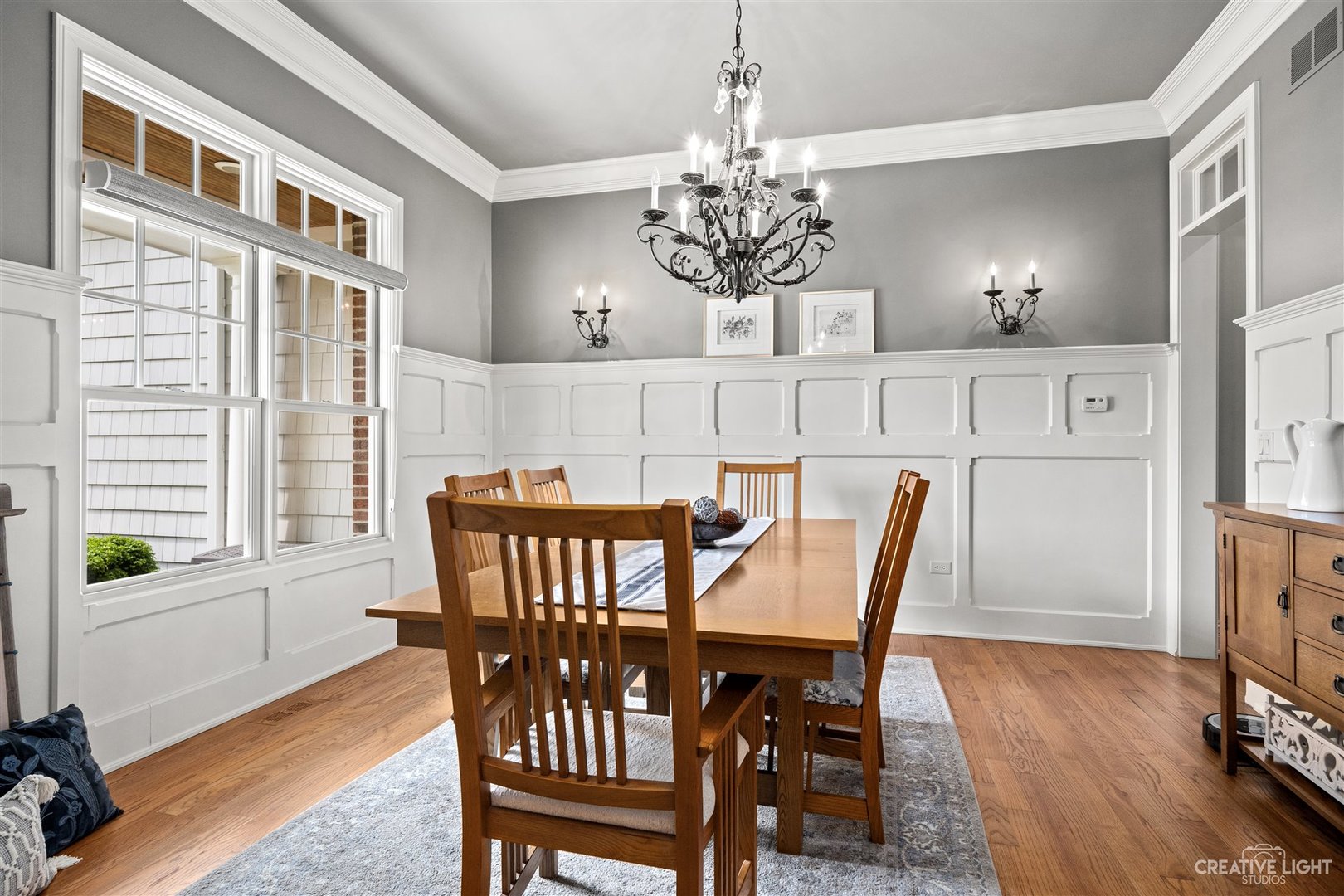 1749 Hunters Ridge Lane Sugar Grove, IL 60554 - Photo 15 of 45 a view of a dining room with furniture window and wooden floor