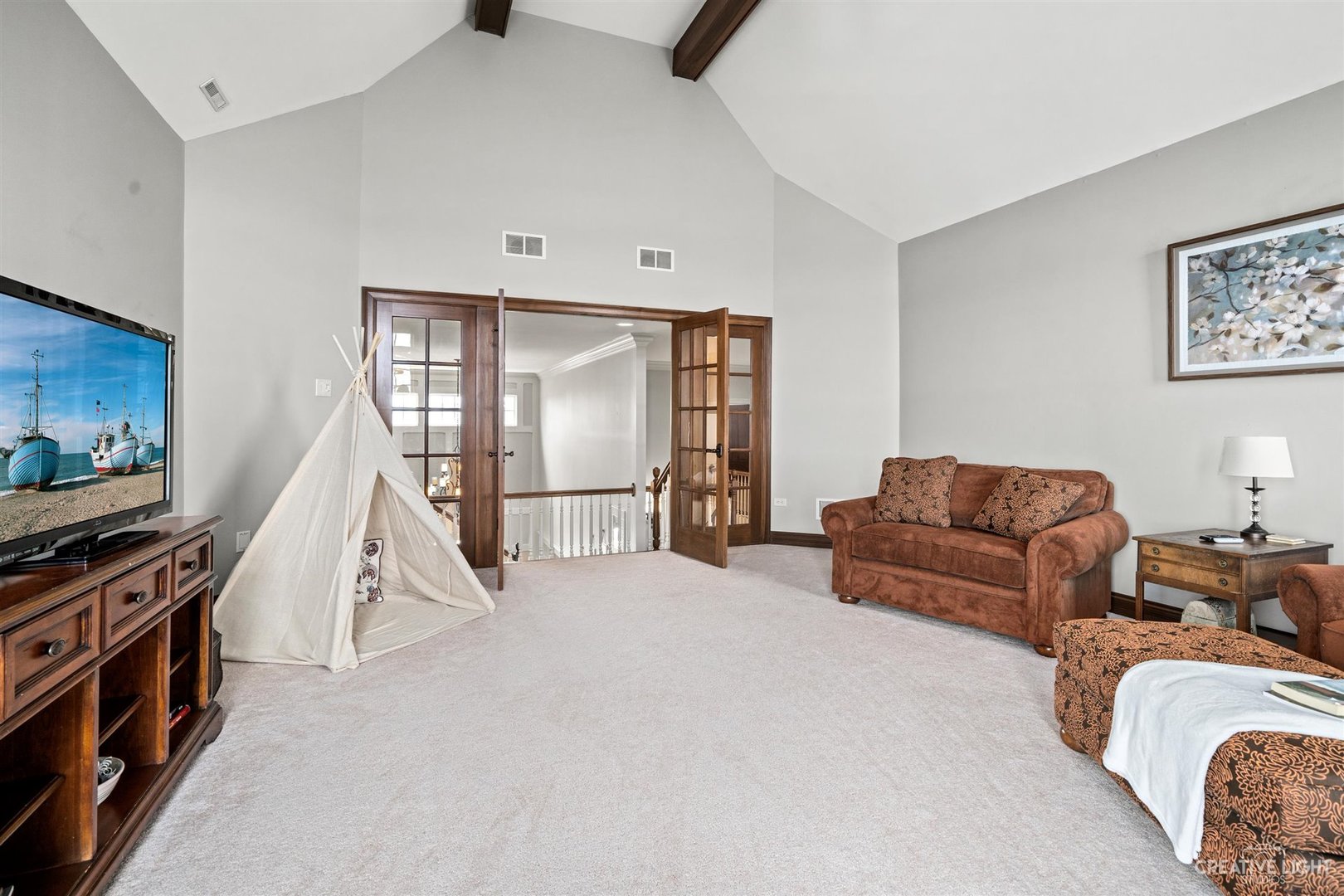 1749 Hunters Ridge Lane Sugar Grove, IL 60554 - Photo 20 of 45 a living room with furniture and a flat screen tv