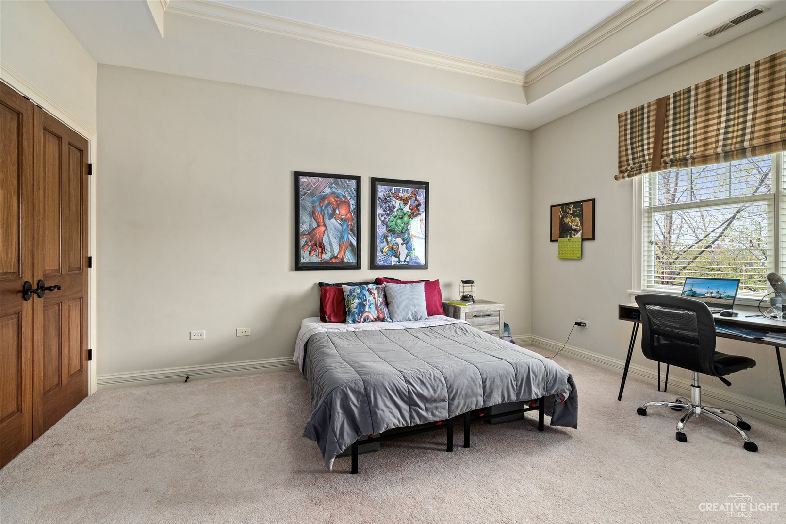 1749 Hunters Ridge Lane Sugar Grove, IL 60554 - Photo 26 of 45 a bedroom with a bed dresser and a window