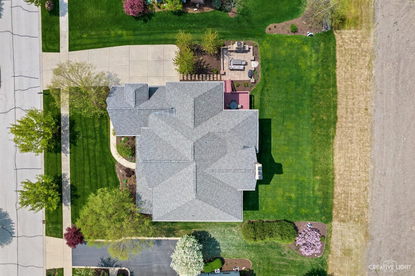 1749 Hunters Ridge Lane Sugar Grove, IL 60554 - Photo 38 of 45 an aerial view of a house with garden space and street view