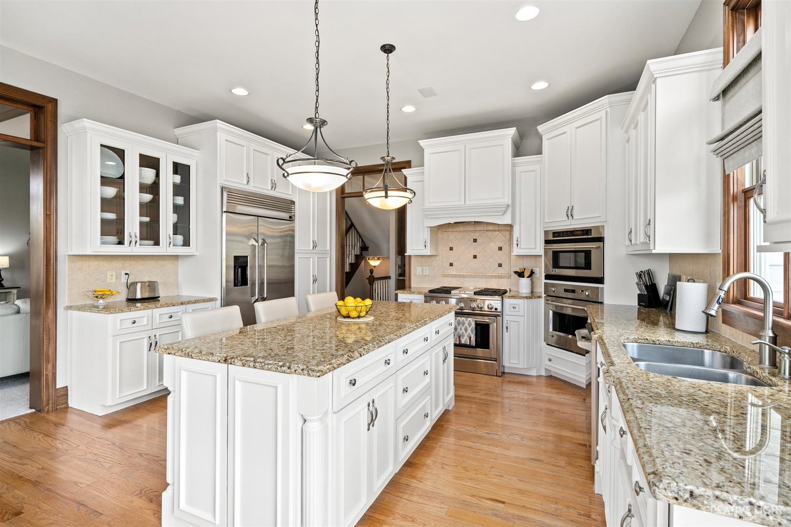 1749 Hunters Ridge Lane Sugar Grove, IL 60554 - Photo 5 of 45 a large kitchen with stainless steel appliances granite countertop a stove oven and a white cabinets