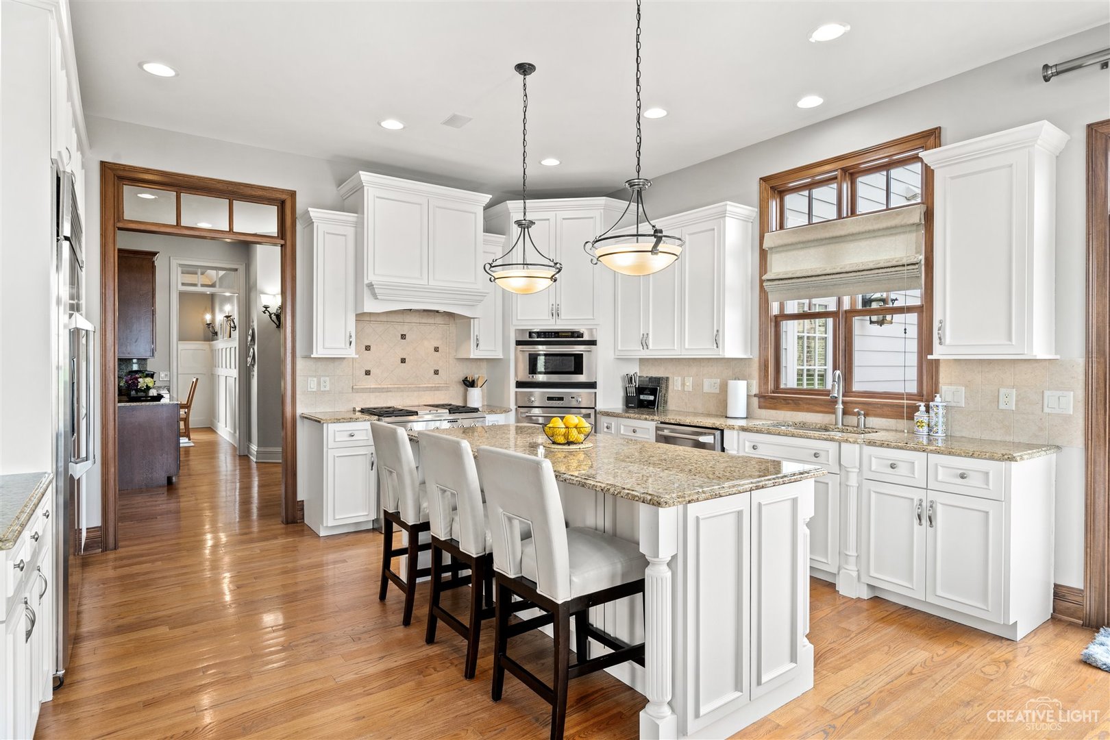 1749 Hunters Ridge Lane Sugar Grove, IL 60554 - Photo 6 of 45 a large kitchen with a table and chairs