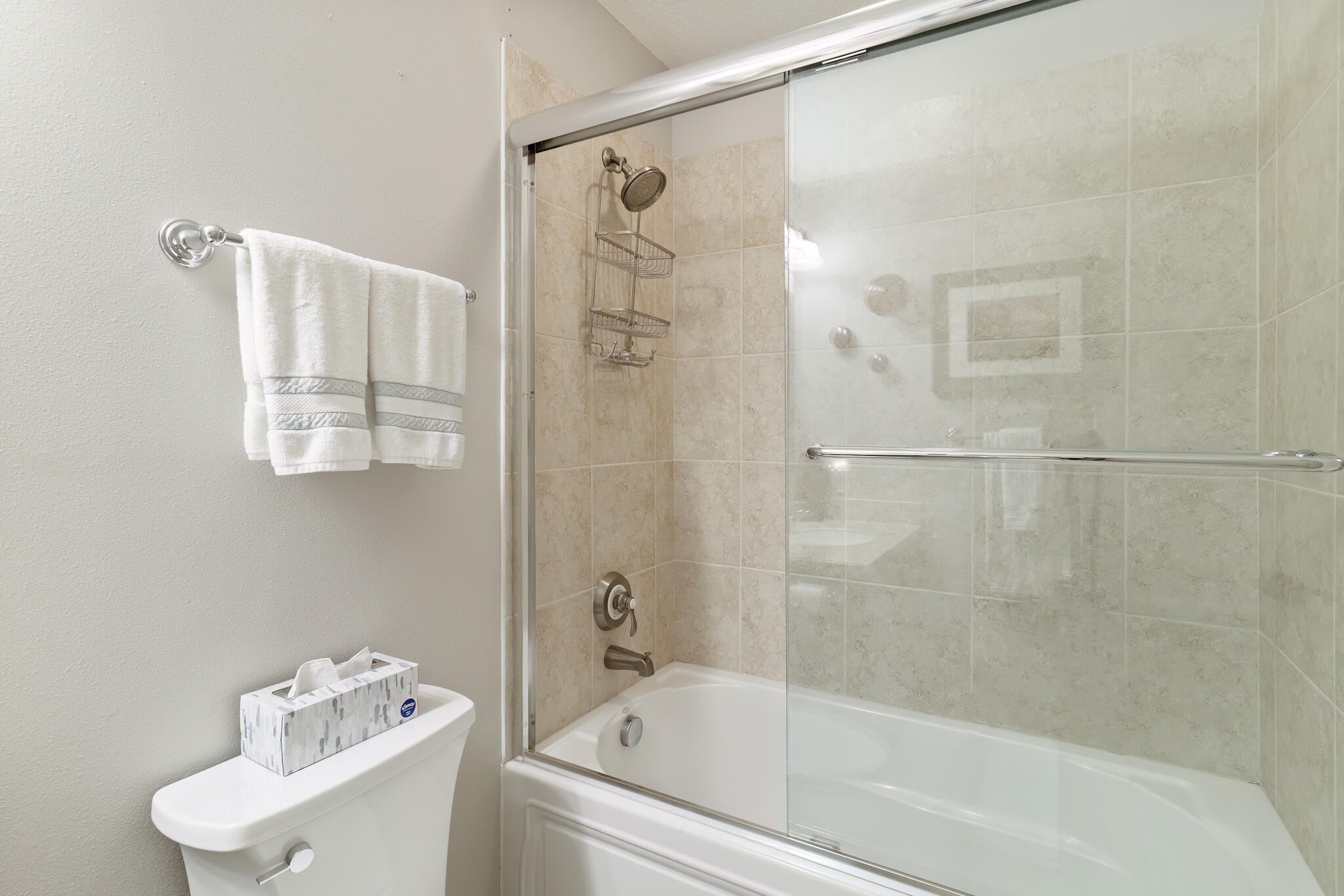 770 Harbor Boulevard, Unit 7E Destin, FL 32541 - Photo 23 of 50 a bathroom with a bathtub and shower
