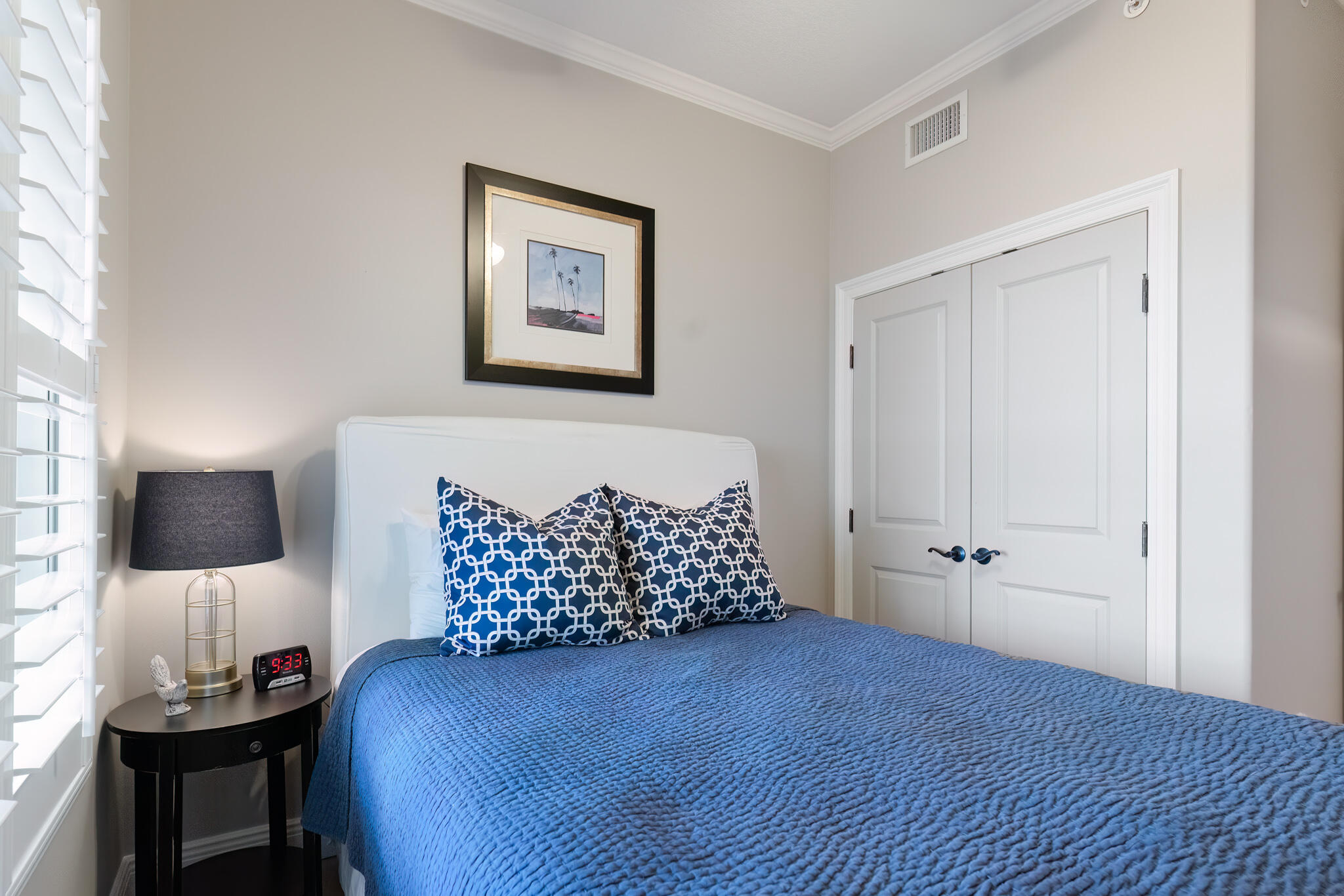770 Harbor Boulevard, Unit 7E Destin, FL 32541 - Photo 25 of 50 a bedroom with a bed and a window