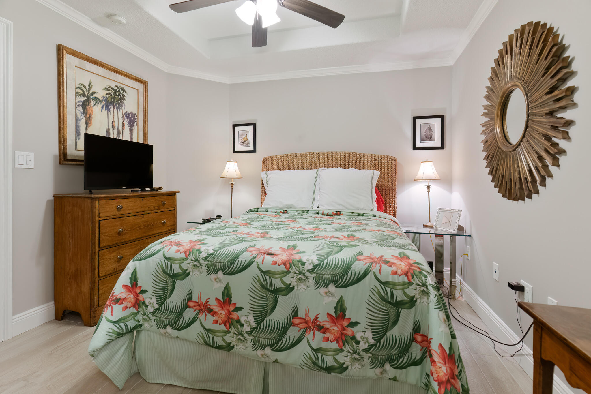 770 Harbor Boulevard, Unit 7E Destin, FL 32541 - Photo 26 of 50 a bedroom with a bed and a flat screen tv