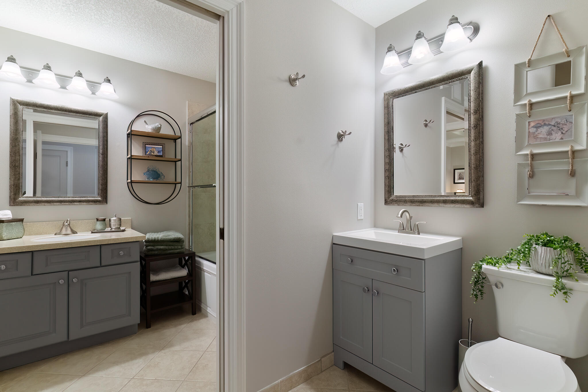 770 Harbor Boulevard, Unit 7E Destin, FL 32541 - Photo 29 of 50 a bathroom with a toilet sink and mirror