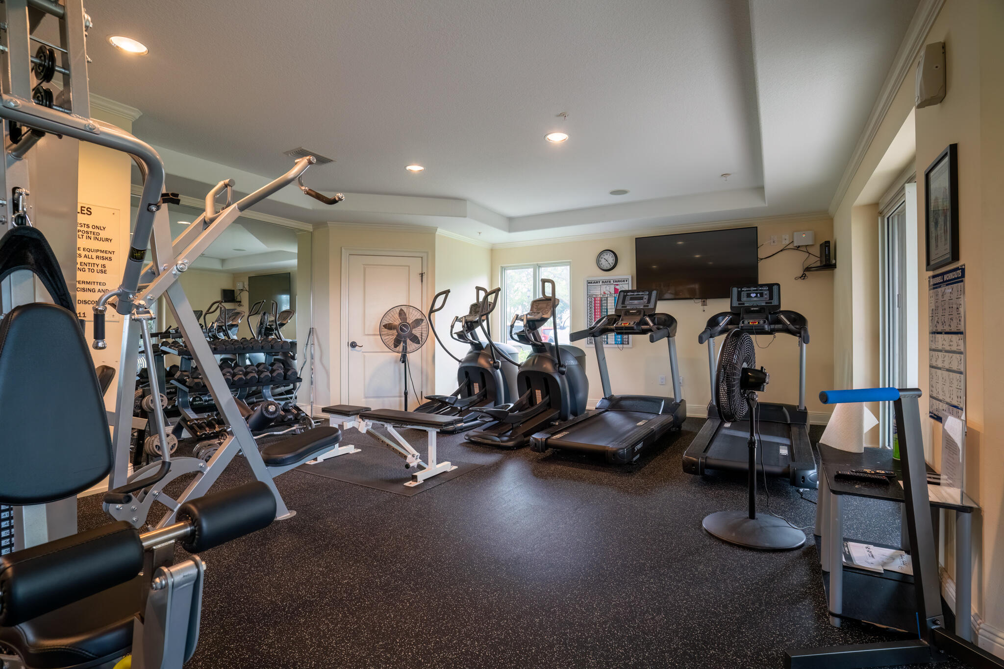 770 Harbor Boulevard, Unit 7E Destin, FL 32541 - Photo 49 of 50 a view of a room with gym equipment