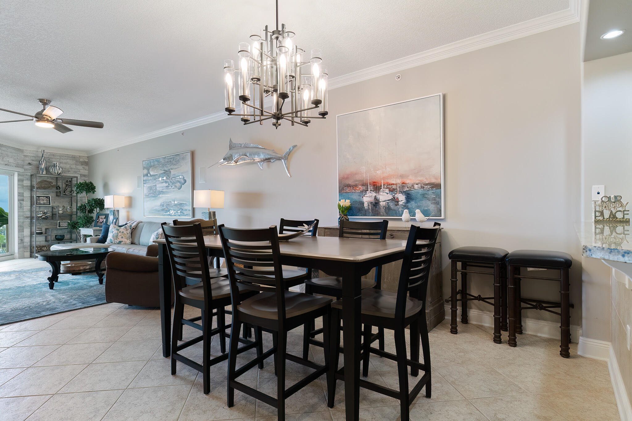 770 Harbor Boulevard, Unit 7E Destin, FL 32541 - Photo 7 of 50 a view of a dining room with furniture and chandelier